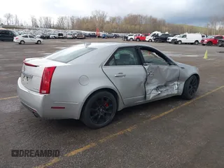 2009 Cadillac CTS AWD z VIN 1G6DH577X90135559, wystawiony jako IAAI lot #42077850 z przebiegiem 175 345 mil mil oraz . Historia ofert i sprzedaży dostępna na DreamBid. Obrazek 4.