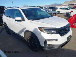 2022 Honda Pilot Special Edition with VIN 5FNYF5H20NB034677, listed as a IAAI auction lot 41372317 with 28,708 mi miles and . Bid and sale history available at carsss.com. Image 1.