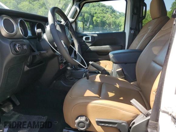 2023 Jeep Gladiator Rubicon with VIN 1C6JJTBG9PL546437, listed as a Copart auction lot 62536575 with 14,106 mi miles and Salvage title. Bid and sale history available at DreamBid. Image 7.