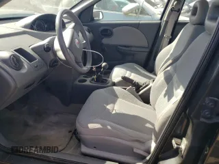 2005 Saturn ION ION 1 z VIN 1G8AF52F65Z142691, wystawiony jako Copart lot #70201554 z przebiegiem 116 731 mil mil oraz Szkoda całkowita • Salvage title. Historia ofert i sprzedaży dostępna na DreamBid. Obrazek 7.