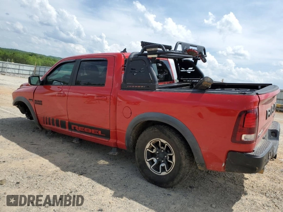 2016 Ram 1500 Rebel z VIN 1C6RR7YT8GS251598, wystawiony jako Copart lot #55291555 z przebiegiem 128 756 mil mil oraz Szkoda całkowita • Salvage title. Historia ofert i sprzedaży dostępna na DreamBid. Obrazek 2.