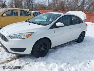 2015 Ford Focus SE with VIN 1FADP3F21FL312736, listed as a IAAI auction lot 41601418 with 137,540 mi miles. Bid and sale history available at carsss.com. Image 2.