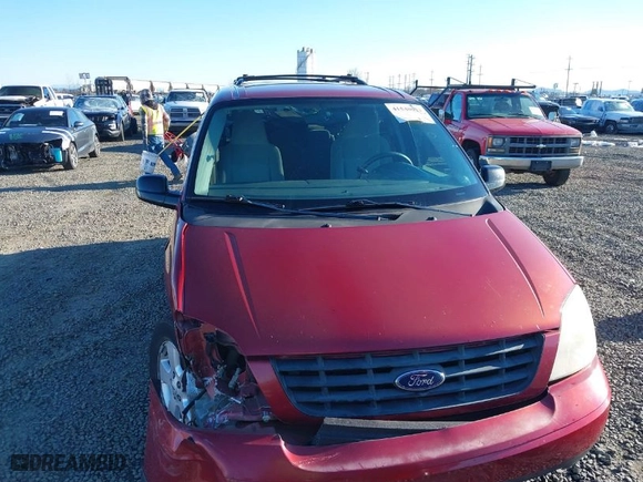 2005 Ford Freestar Wagon SES with VIN 2FMZA57645BA50977, listed as a IAAI auction lot 41540023 with 149,319 mi miles. Bid and sale history available at carsss.com. Image 12.