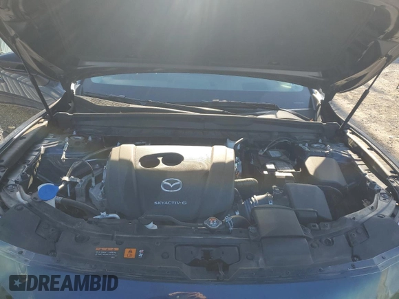 2023 Mazda CX-50 S Premium Plus with VIN 7MMVABEM8PN129773, listed as a Copart auction lot 82489824 with 31,567 mi miles and Salvage Title. Bid and sale history available at DreamBid. Image 12.
