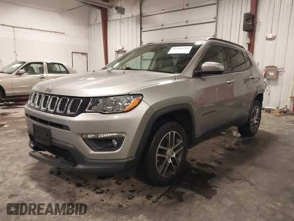 2019 Jeep Compass Latitude with VIN 3C4NJDBB6KT812711, listed as a IAAI auction lot 41565166 with 69,582 mi miles and . Bid and sale history available at carsss.com. Image 2.