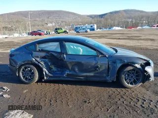2023 Tesla Model 3 with VIN 5YJ3E1EA7PF509567, listed as a IAAI auction lot 41422396 with 28,914 mi miles. Bid and sale history available at carsss.com. Image 12.