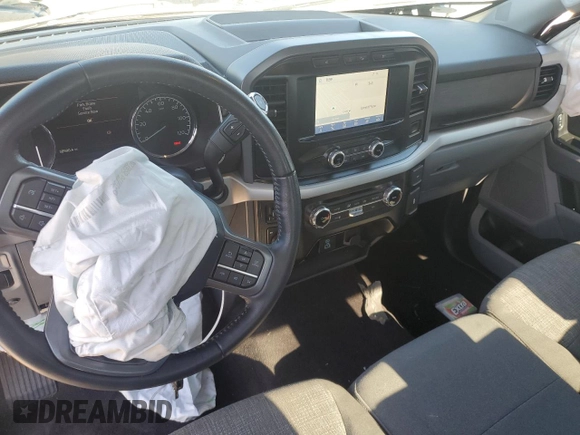 2022 Ford F-150 XL with VIN 1FTMF1E51NKD59265, listed as a Copart auction lot 77193424 with 38,590 mi miles and Salvage Title. Bid and sale history available at DreamBid. Image 8.