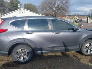 2019 Honda CR-V LX with VIN 5J6RW6H34KL005317, listed as a IAAI auction lot 41225711 with 59,166 mi miles. Bid and sale history available at carsss.com. Image 14.
