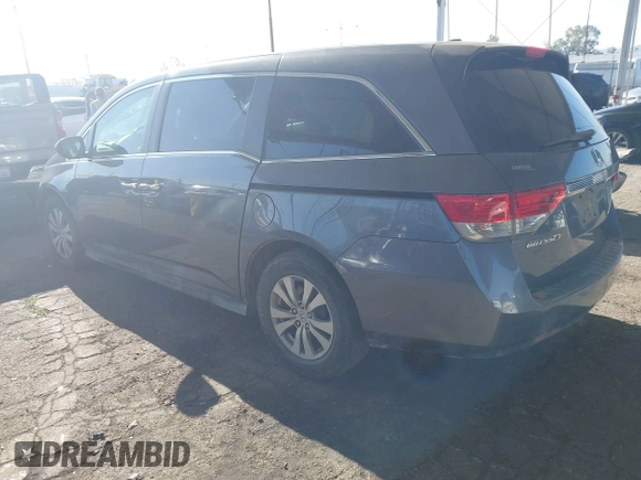 2014 Honda Odyssey EX-L with VIN 5FNRL5H61EB079742, listed as a IAAI auction lot 41992473 with 125,397 mi miles and . Bid and sale history available at carsss.com. Image 3.