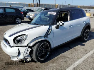2016 MINI Countryman S with VIN WMWZC3C56GWT07894, listed as a Copart auction lot 59388905 with 80,420 mi miles and Salvage title. Bid and sale history available at DreamBid. Image 1.