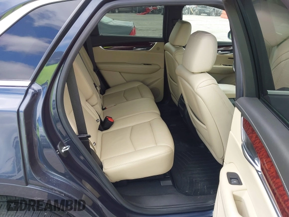 2019 Cadillac XT5 Luxury FWD with VIN 1GYKNCRS7KZ199542, listed as a IAAI auction lot 42032139 with 79,487 mi miles and . Bid and sale history available at DreamBid. Image 8.