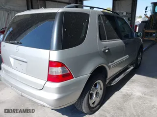 2002 Mercedes-Benz M-Class with VIN 4JGAB54E32A360356, listed as a IAAI auction lot 40540769 with 235,810 mi miles. Bid and sale history available at carsss.com. Image 4.