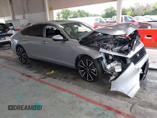 2023 Honda Accord Touring with VIN 1HGCY2F87PA039060, listed as a IAAI auction lot 42382912 with 36,007 mi miles and . Bid and sale history available at DreamBid. Image 1.