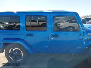 2014 Jeep Wrangler Unlimited Sahara with VIN 1C4HJWEG1EL188445, listed as a IAAI auction lot 41654579 with 79,948 mi miles. Bid and sale history available at carsss.com. Image 13.