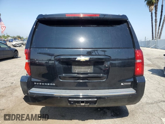 2017 Chevrolet Suburban Premier with VIN 1GNSCJKC8HR226797, listed as a Copart auction lot 62874585 with 150,994 mi miles and Salvage title. Bid and sale history available at DreamBid. Image 6.