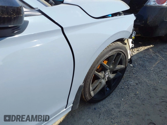 2024 Honda Civic Sport with VIN 2HGFE2F59RH539303, listed as a IAAI auction lot 41417721 with 7,240 mi miles and . Bid and sale history available at DreamBid. Image 19.