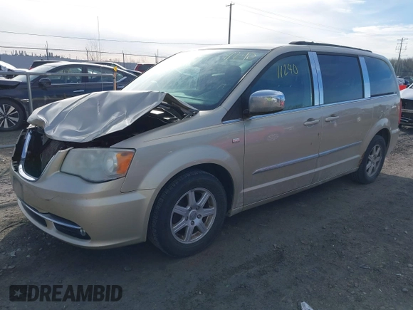 2011 Chrysler Town & Country Touring z VIN 2A4RR5DG6BR655235, wystawiony jako IAAI lot #41811240 z przebiegiem 244 399 mil mil oraz . Historia ofert i sprzedaży dostępna na DreamBid. Obrazek 2.