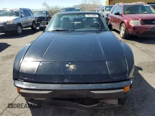 1986 Porsche 944 z VIN WP0AA0942GN460359, wystawiony jako Copart lot #56519965 z przebiegiem 95 915 mil mil oraz Szkoda całkowita • Salvage title. Historia ofert i sprzedaży dostępna na DreamBid. Obrazek 5.
