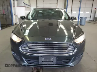 2015 Ford Fusion SE z VIN 3FA6P0H98FR295646, wystawiony jako Copart lot #57055105 z przebiegiem 121 515 mil mil oraz Szkoda całkowita • Salvage title. Historia ofert i sprzedaży dostępna na DreamBid. Obrazek 5.