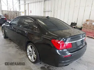 2011 BMW 7 Series 750Li xDrive with VIN WBAKC8C58BC432517, listed as a IAAI auction lot 41874352 with 125,288 mi miles and . Bid and sale history available at DreamBid. Image 3.