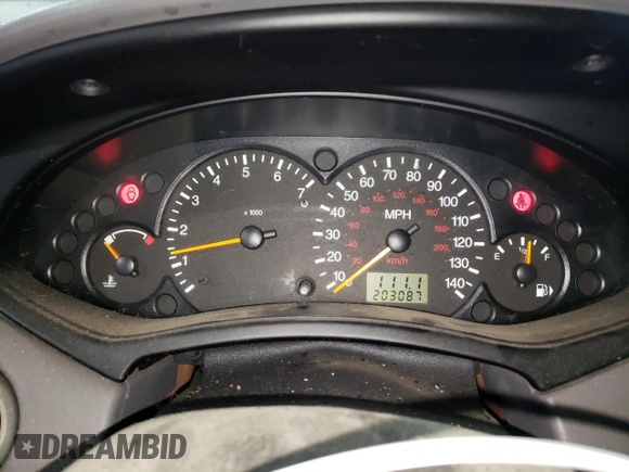 2004 Ford Focus ZX5 with VIN 3FAFP37354R102932, listed as a Copart auction lot 78814004 with 203,087 mi miles and Salvage title. Bid and sale history available at DreamBid. Image 9.