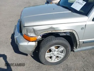 2006 Jeep Commander z VIN 1J8HG48N16C363512, wystawiony jako IAAI lot #41991213 z przebiegiem 205 757 mil mil oraz . Historia ofert i sprzedaży dostępna na DreamBid. Obrazek 12.