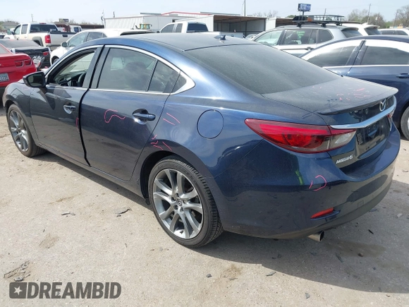 2016 Mazda 6 i Grand Touring with VIN JM1GJ1W59G1439075, listed as a IAAI auction lot 41792755 with 99,215 mi miles and . Bid and sale history available at DreamBid. Image 3.