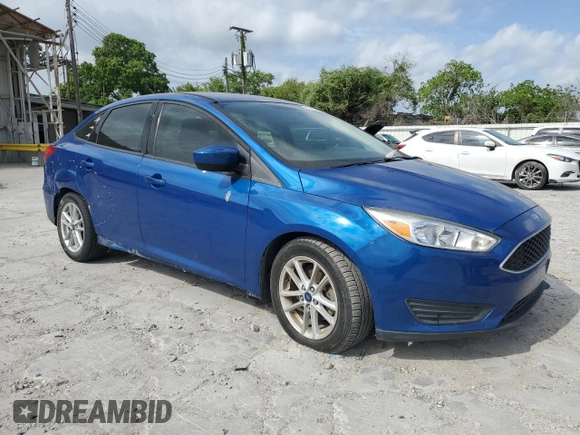 2018 Ford Focus SE with VIN 1FADP3F24JL205544, listed as a Copart auction lot 53555065 with 63,810 mi miles and Clean title. Bid and sale history available at DreamBid. Image 4.