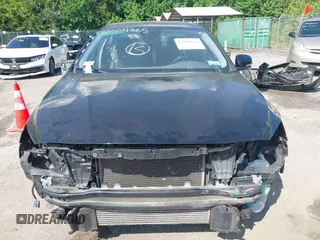 2015 Volvo S60 T5 Drive-E Premier with VIN YV140MFK6F1346875, listed as a IAAI auction lot 42004365 with 98,574 mi miles and . Bid and sale history available at DreamBid. Image 13.