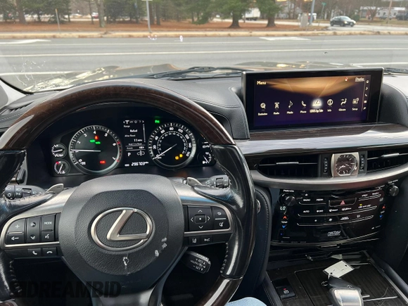 2016 Lexus LX 570 with VIN JTJHY7AX7G4203810, listed as a Copart auction lot 86017494 with 296,703 mi miles and Clean Title. Bid and sale history available at DreamBid. Image 7.