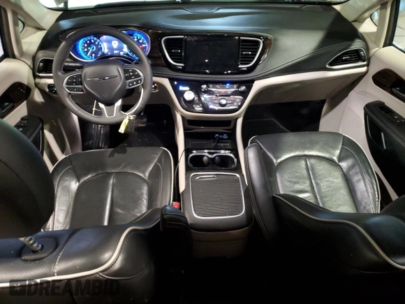 2023 Chrysler Pacifica Limited with VIN 2C4RC1GG0PR529598, listed as a Copart auction lot 55287345 with 65,714 mi miles and Salvage title. Bid and sale history available at DreamBid. Image 8.
