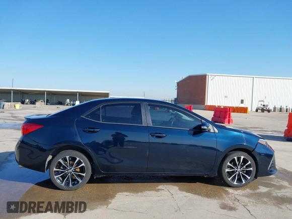 2019 Toyota Corolla L with VIN 2T1BURHE8KC164090, listed as a IAAI auction lot 41976669 with 163,794 mi miles and . Bid and sale history available at DreamBid. Image 13.