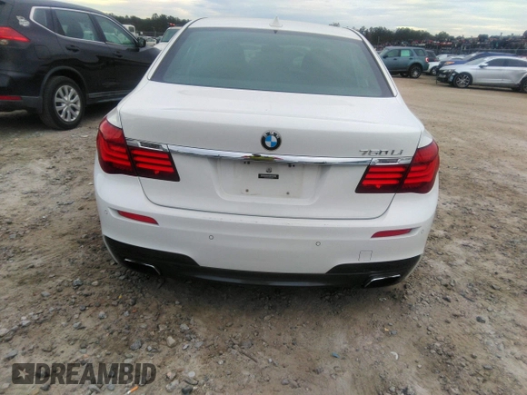 2015 BMW 7 Series 750Li with VIN WBAYE8C50FD781160, listed as a IAAI auction lot 41061232 with 154,496 mi miles. Bid and sale history available at carsss.com. Image 16.
