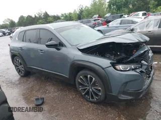 2023 Mazda CX-50 S Premium Plus z VIN 7MMVABEMXPN104518, wystawiony jako IAAI lot #42184893 z przebiegiem 61 991 mil mil oraz . Historia ofert i sprzedaży dostępna na DreamBid. Obrazek 13.