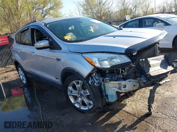 2013 Ford Escape SEL with VIN 1FMCU0HX4DUB98238, listed as a IAAI auction lot 41973221 with 131,590 mi miles and . Bid and sale history available at DreamBid. Image 1.