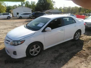 2011 Toyota Corolla L with VIN 2T1BU4EE3BC614784, listed as a IAAI auction lot 42024386 with 210,901 mi miles. Bid and sale history available at carsss.com. Image 2.