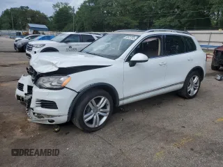2013 Volkswagen Touareg Lux with VIN WVGEF9BP4DD013167, listed as a Copart auction lot 60422255 with 157,319 mi miles and Salvage title. Bid and sale history available at DreamBid. Image 1.