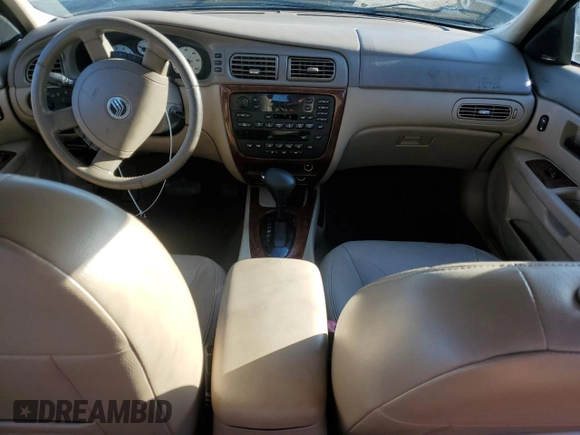 2004 Mercury Sable LS Premium with VIN 1MEHM55S84A614002, listed as a Copart auction lot 56582965 with 185,589 mi miles and Salvage title. Bid and sale history available at DreamBid. Image 8.