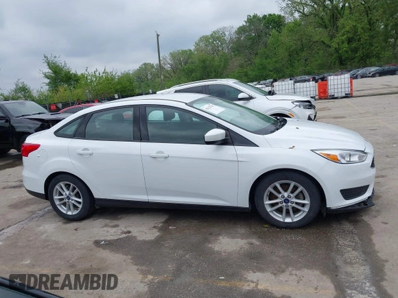 2018 Ford Focus SE with VIN 1FADP3F29JL223389, listed as a IAAI auction lot 42127707 with 87,145 mi miles and . Bid and sale history available at DreamBid. Image 14.
