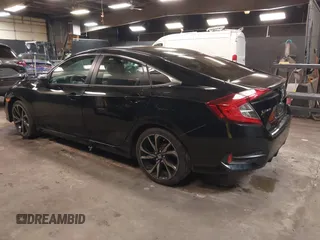 2019 Honda Civic Sport with VIN 2HGFC2F84KH590469, listed as a IAAI auction lot 41686757 with 79,602 mi miles and . Bid and sale history available at DreamBid. Image 3.