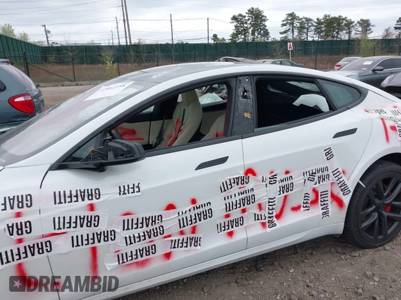 2023 Tesla Model S Plaid with VIN 5YJSA1E68PF507197, listed as a IAAI auction lot 42062258 with Not provided miles and . Bid and sale history available at DreamBid. Image 6.