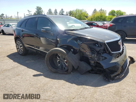2023 Cadillac XT5 AWD Sport with VIN 1GYKNGRS8PZ100581, listed as a Copart auction lot 55157035 with 14,637 mi miles and Salvage title. Bid and sale history available at DreamBid. Image 4.
