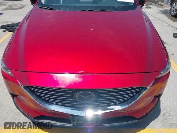 2018 Mazda CX-9 Touring with VIN JM3TCBCY6J0201556, listed as a IAAI auction lot 42285456 with 144,841 mi miles and . Bid and sale history available at DreamBid. Image 19.