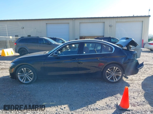 2017 BMW 3 Series 330i with VIN WBA8B9C58HK675536, listed as a IAAI auction lot 41665254 with 122,098 mi miles. Bid and sale history available at carsss.com. Image 14.