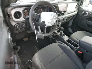 2024 Jeep Wrangler Sport S with VIN 1C4PJXAG2RW335190, listed as a Copart auction lot 51767465 with 2,717 mi miles and Salvage title. Bid and sale history available at DreamBid. Image 8.
