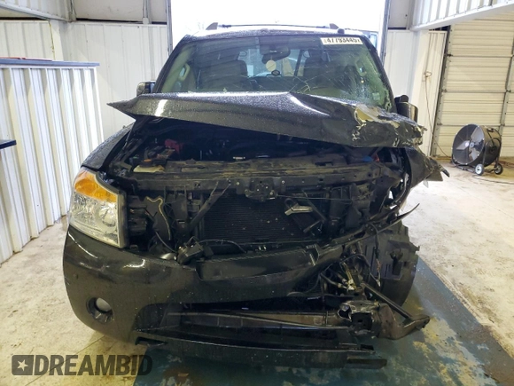 2015 Nissan Armada Platinum z VIN 5N1BA0NFXFN620977, wystawiony jako Copart lot #47793445 z przebiegiem 172 514 mil mil oraz Szkoda całkowita • Salvage title. Historia ofert i sprzedaży dostępna na DreamBid. Obrazek 5.
