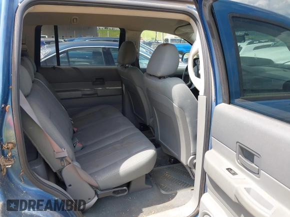 2005 Dodge Durango SXT with VIN 1D4HB38N95F575185, listed as a IAAI auction lot 42680439 with 201,781 mi miles and . Bid and sale history available at DreamBid. Image 8.
