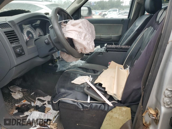 2005 Dodge Dakota Laramie with VIN 1D7HW58N75S100449, listed as a Copart auction lot 86336834 with Not Provided miles and Salvage Title. Bid and sale history available at DreamBid. Image 7.