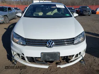 2015 Volkswagen Eos Komfort with VIN WVWBW8AH0FV001011, listed as a IAAI auction lot 41297299 with 81,444 mi miles and . Bid and sale history available at DreamBid. Image 18.