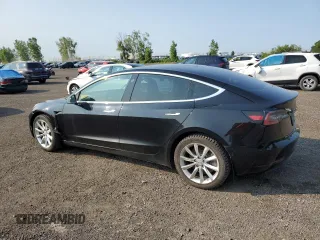 2020 Tesla Model 3 Standard Range Plus with VIN 5YJ3E1EA8LF609364, listed as a Copart auction lot 58828794 with 127,781 mi miles and Non Repairable. Bid and sale history available at DreamBid. Image 2.